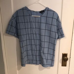 Blue checkered shirt with buttons on back